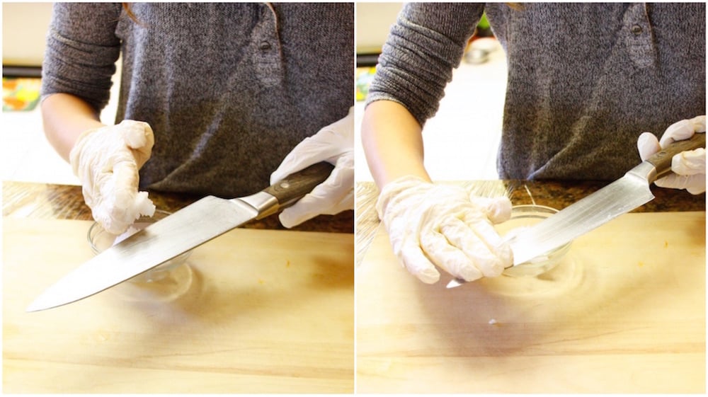 prepping the knife to cut jackfruit. 