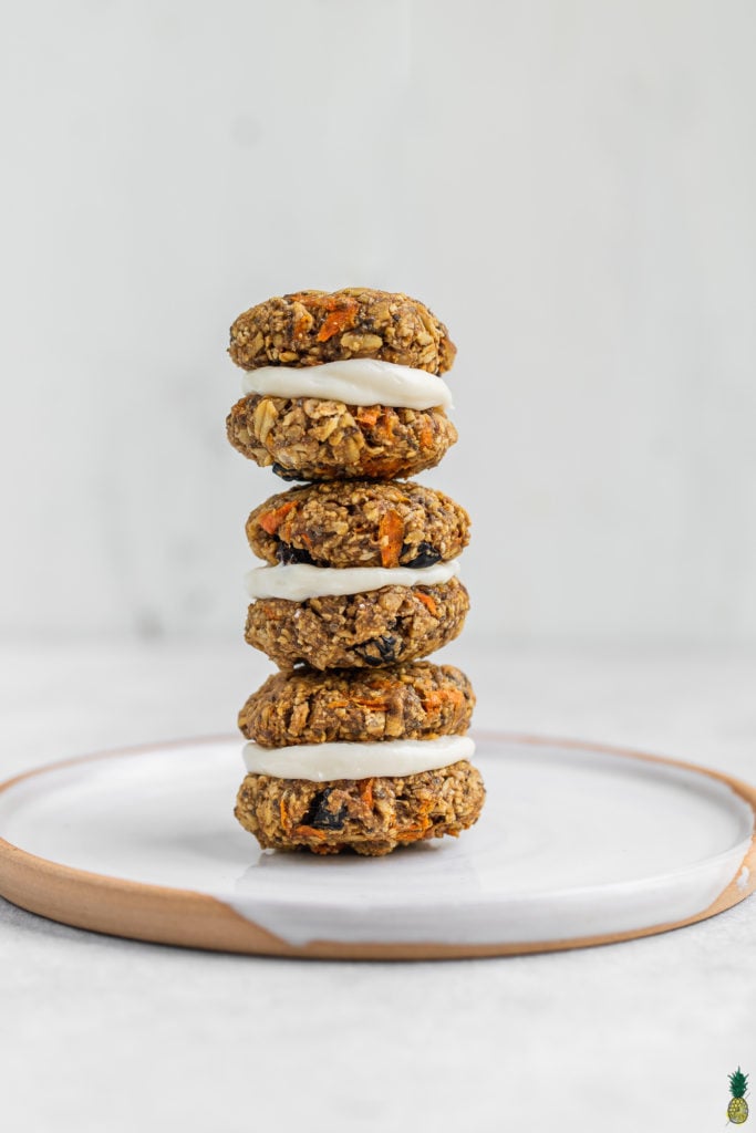 forward facing shot of carrot cake cookie sandwiches stacked up