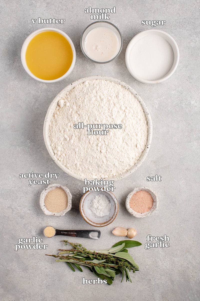 ingredients for Garlic Herb Dinner Rolls on gray board