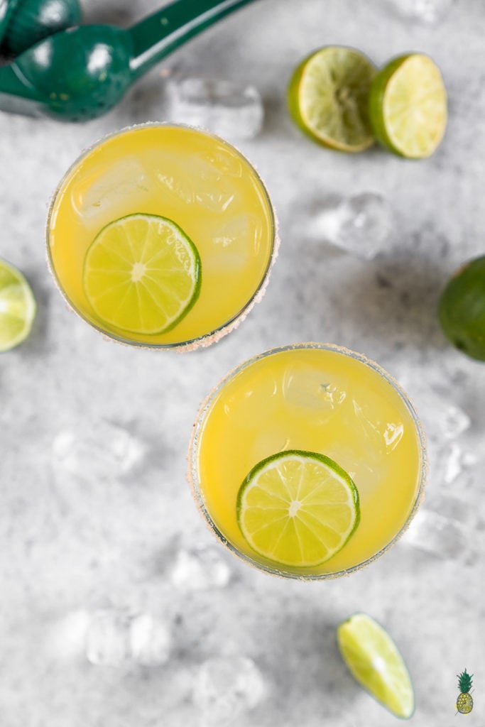 Easy Mango Kombucha Margaritas that are easy to make and perfect for New Year's Eve! #vegan #cocktail #margarita #kombucha #easy #musttry