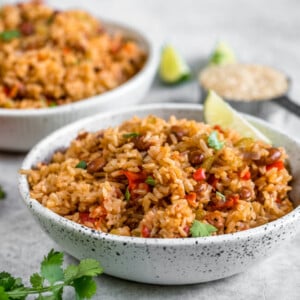 This vegan Spanish rice and beans make for an easy & healthy rice cooker meal! #ricecooker #easy #healthy #lazy #spanishrice #onepot #budgetfriendly #oilfree #vegan