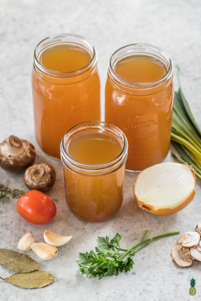 No need to buy vegetable broth from the store ever again! This step-by-step guide to making it at home is easy, cheap AND low-sodium! #homemade #vegetablebroth #vegetablestock #zerowaste #budget #lowsodium #healthy #vegan #oilfree #hack #diy