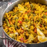 MUST TRY Loaded Vegan Paella! Super fulling, easy to make AND loaded with vegetables! #vegetable #loaded #paella #vegan #veganpaella #entree #veganentree #dinner #vegandinner #veganlunch #easyvegan #healthyvegan