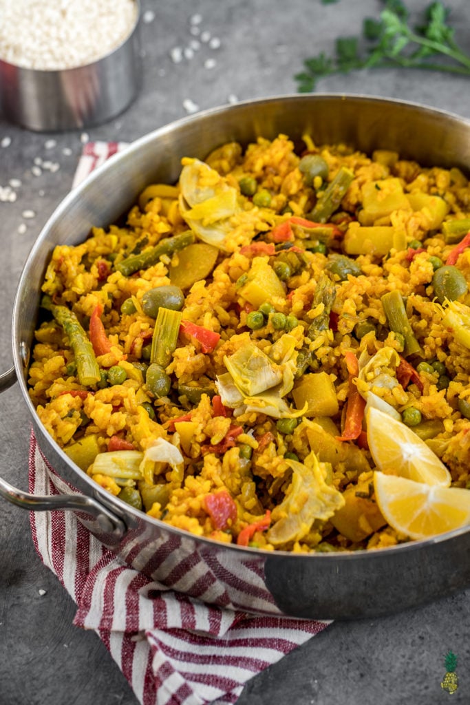 MUST TRY Loaded Vegan Paella! Super fulling, easy to make AND loaded with vegetables! #vegetable #loaded #paella #vegan #veganpaella #entree #veganentree #dinner #vegandinner #veganlunch #easyvegan #healthyvegan