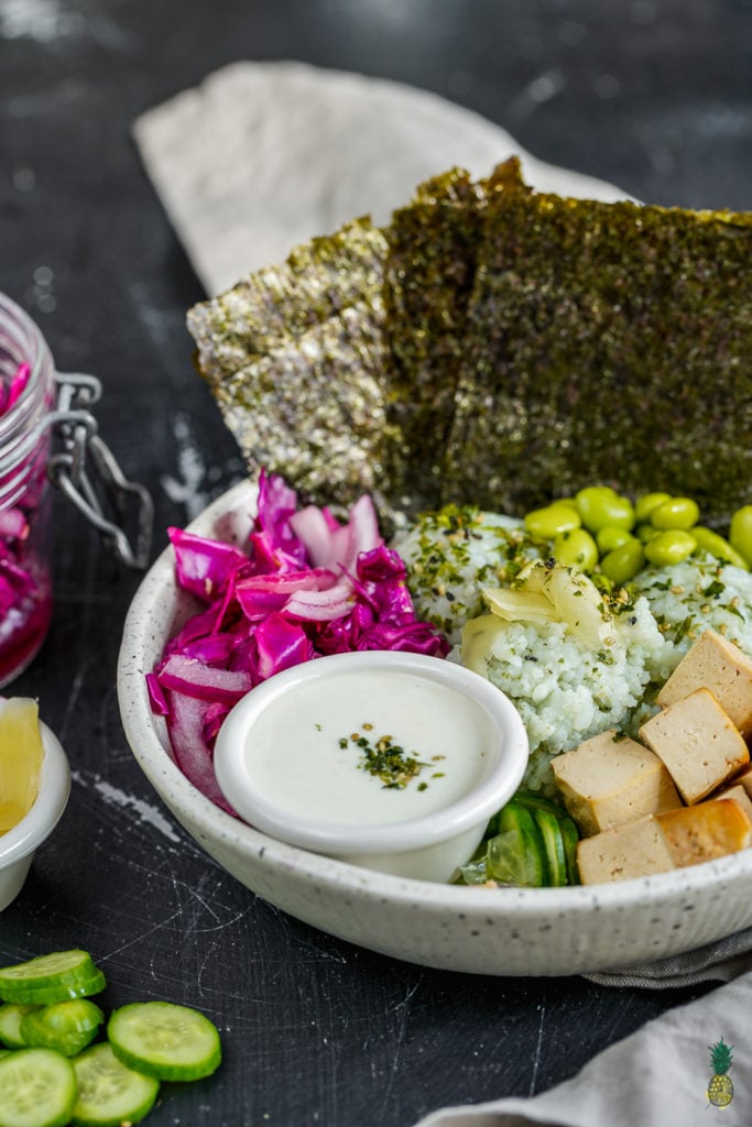 Easy, filling and flavorful vegan sushi buddha bowl-- perfect for vegans and nonvegans alike! #sushi #buddhabowl #vegansushi #veganmeal #entree #veganentree #lunch #dinner #easyvegan #1hourmeal #weeknightmeal #furikake