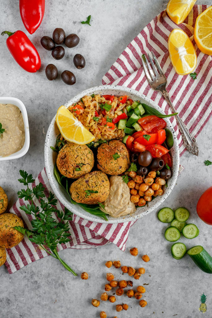 The best buddha bowl rendition yet! This Vegan Mediterranean Buddha Bowl is hearty, nutritionally dense, jam packed with flavor and easy to make! #Vegan #Mediterranean #Buddha #Bowl #entree #veganbowl #easy #lunch #work #onthego #budget #musttry #fresh #falafel #chickpeas #hummus #homemade