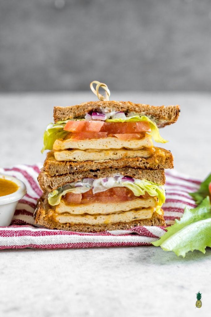 a delicious and easy to make buffalo tofu sandwich with homemade vegan ranch dressing - sweetsimplevegan.com #vegan #sandwich #buffalo #tofu