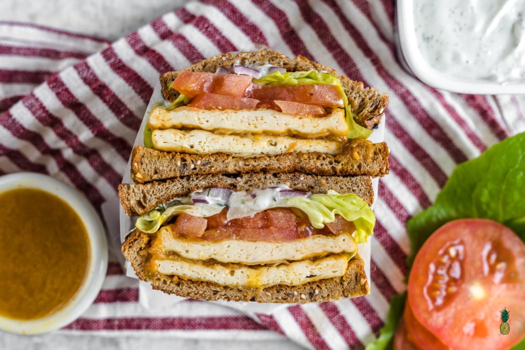 a delicious and easy to make buffalo tofu sandwich with homemade vegan ranch dressing - sweetsimplevegan.com #vegan #sandwich #buffalo #tofu