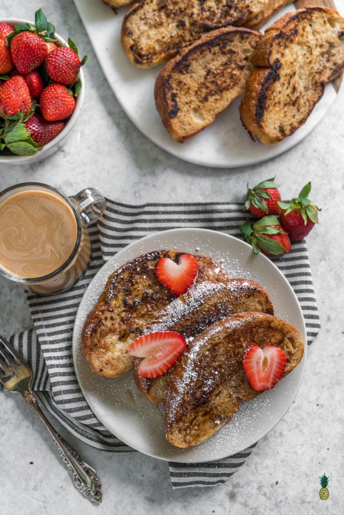 An easy 6-ingredient vegan french toast! The classic comfort breakfast taken for the twist with the addition of protein-rich chickpea flour and 100% plant-based ingredients--tastier and healthier than the traditional recipe! #vegan #breakfast #veganbreakfast #oilfree #easyrecipe #veganized #musttryvegan #toast #french #entree #meal #kids