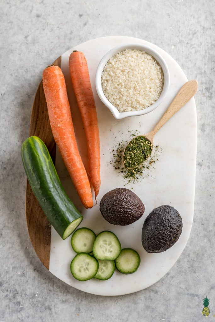 This easy vegan sushi casserole deserves a place at your dinner table or your next gathering! It is the perfect mix of salty, creamy and crunchy + it requires just 6 simple ingredients to make. #sushi #casserole #easy #6ingredients #vegan #vegansushi #easyvegan #veganparty #partyrecipe #foolproof #musttryvegan #musttry #avocado #easysushi #entree #party #lunch #dinner