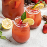 Your new favorite summer beverage--an easy and refined sugar-free strawberry lemonade that is sweetened with dates and made with just 4 simple ingredients! #sugarfree #4ingredients #lastminute #strawberrylemonade #datesweetened #summerbeverage #summer #picnic #vegan #sweetsimplevegan #party