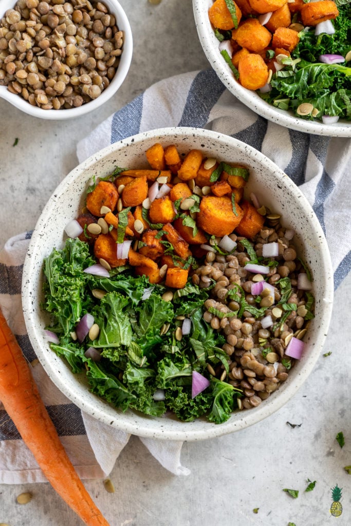 A healthy, filling and flavor-packed meal that is perfect for lunch or dinner and is great to take on the go. Filled with tender cumin roasted carrots, lentils, a garam masala-infused vinaigrette, mint, greens and more! #garammasala #greens #lentils #proteinpacked #veganprotein #easyvegan #onthego #lunch #bentobox #underanhour #foolproof #weeknight #leftovers