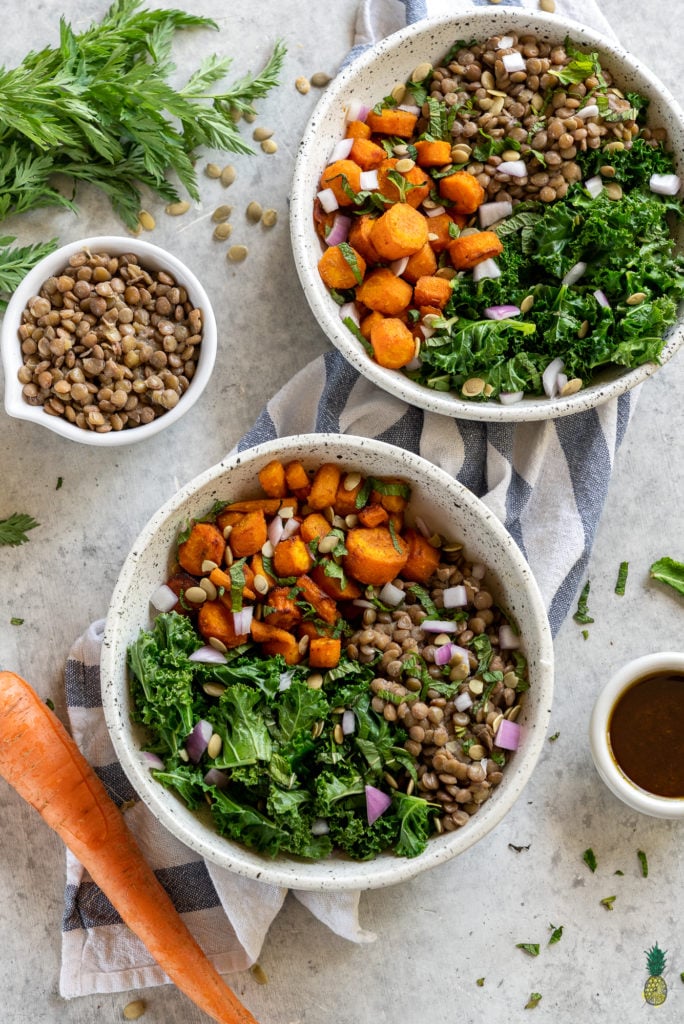 A healthy, filling and flavor-packed meal that is perfect for lunch or dinner and is great to take on the go. Filled with tender cumin roasted carrots, lentils, a garam masala-infused vinaigrette, mint, greens and more! #garammasala #greens #lentils #proteinpacked #veganprotein #easyvegan #onthego #lunch #bentobox #underanhour #foolproof #weeknight #leftovers