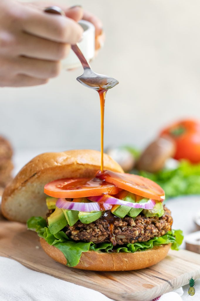 These vegan burgers are easy to make, require simple ingredients and is jam-packed with plant protein. Plus, they are bursting with flavor and are perfect for your next summer party. #veggie #burger #vegan #easy #veganprotein #plantprotein #vegansummer #summerrecipe #party #vegankids #sweetsimplevegan #lunch #dinner #entree