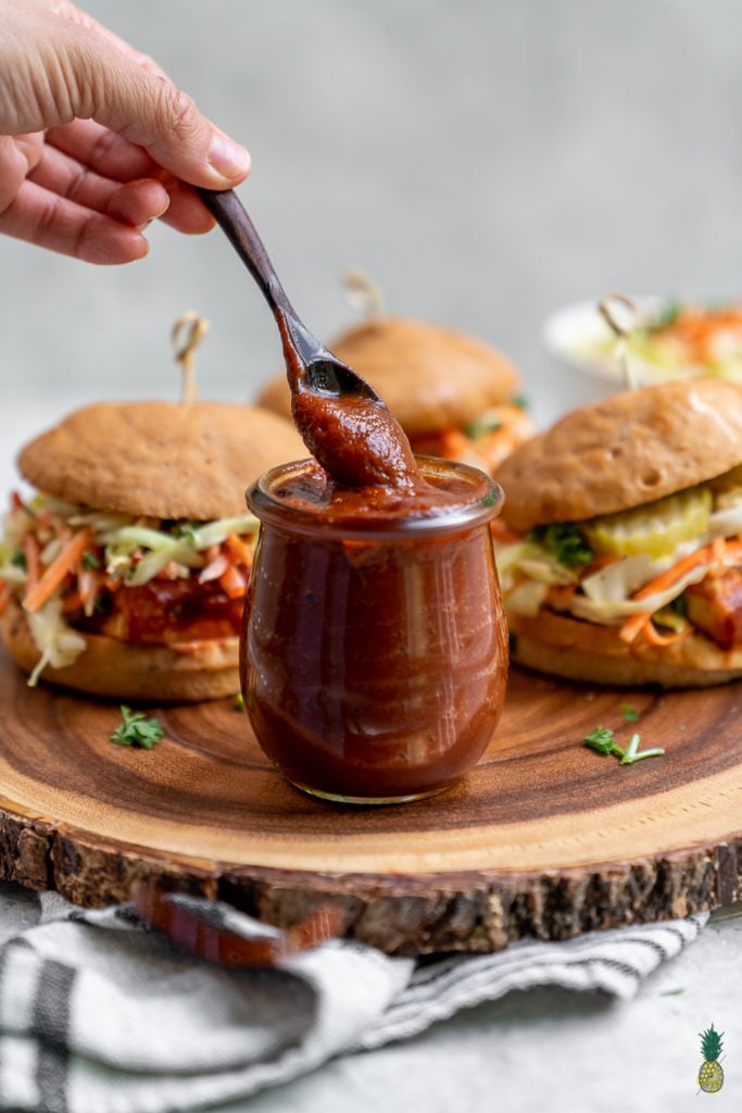 An easy and homemade barbecue sauce that is sweetened with dates, made with simple ingredients and ready in under an hour. This is a must make recipe for the summer and is the perfect addition to any backyard barbecue! #datesweetened #sugarfree #barbecuesauce #oilfree #vegan #summerrecipe #veganbarbecue #sauce #dip #side #staple #bestvegan