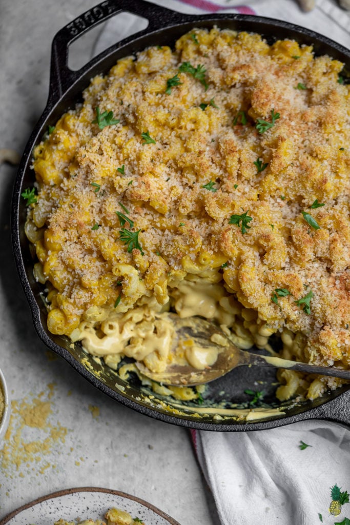 overhead image of vegan mac and cheese with scoop taken out