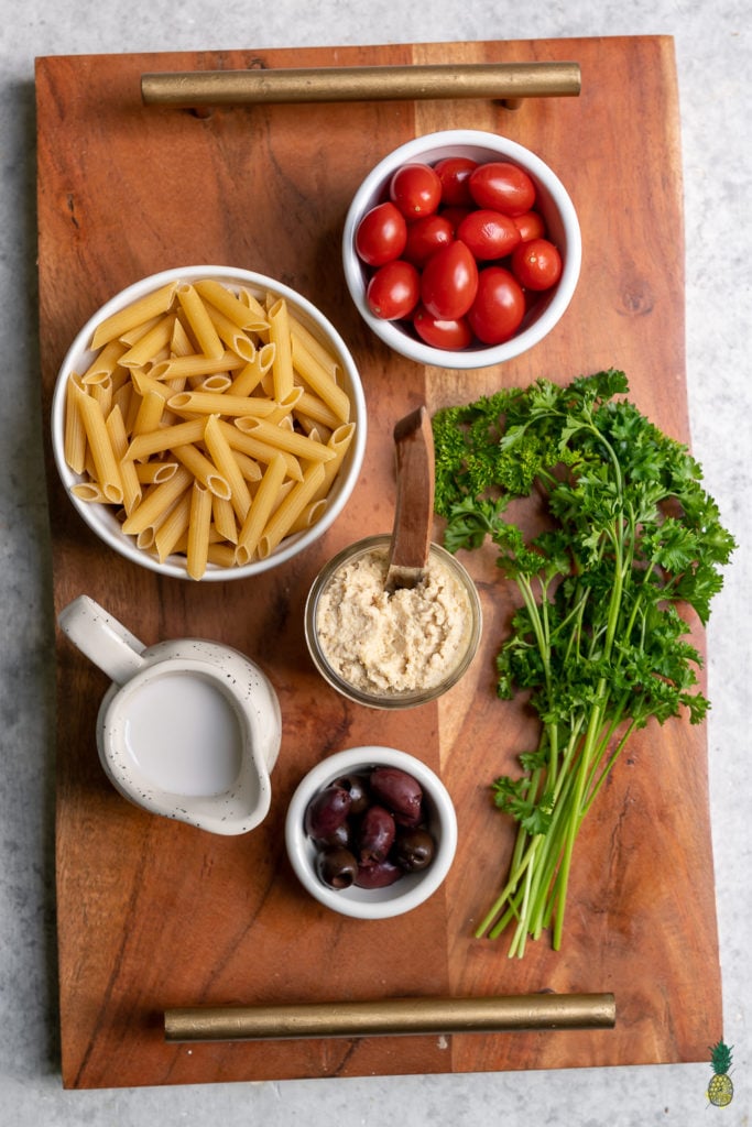 The perfect lazy meal that is ready in about 15-minutes! This hummus pasta requires just one pot and 5 simple ingredients. #vegan #hummuspasta #easymeal #lazymeal #onepot #5ingredient #lazydinner #quickdinner #kidfriendly #sweetsimplevegan