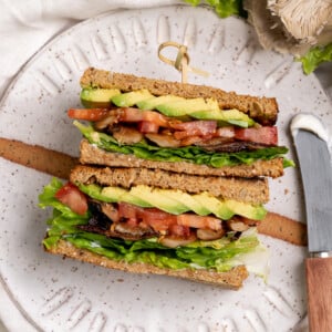 Behold your new favorite sandwich—a quick and easy oyster mushroom sandwich made in just 15 minutes that is packed with flavor and easy to take on the go! #MLTA #BLTA #Vegansandwich #easymeal #lazymeal #veganized #impressivelunch #onthego #musttry #lastminute #partymeal #kidslunch #summer #sweetsimplevegan