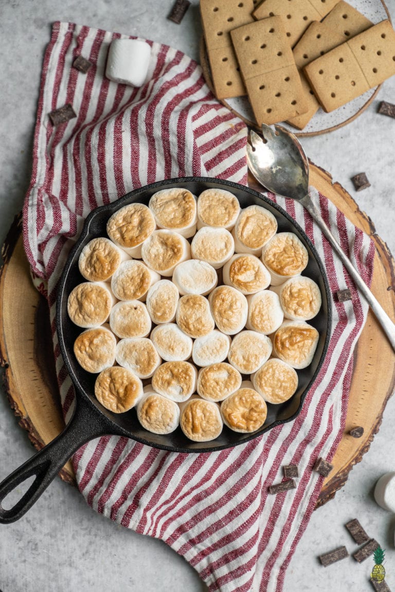 overhead image of s'mores dip on styled background