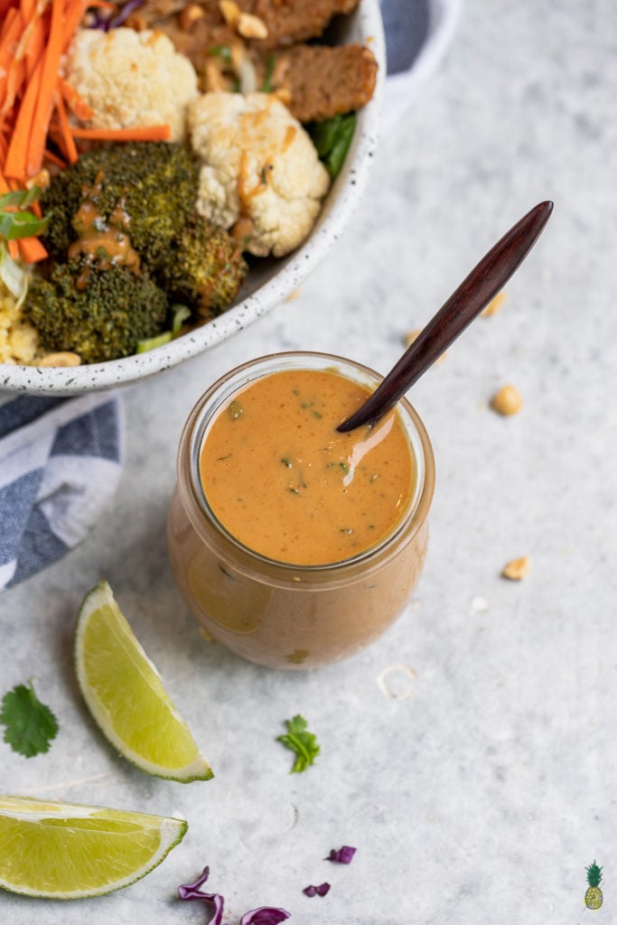 These Thai peanut grain bowls are easy to make and are perfect for an on the go lunch or dinner! Peanut Sauce, roasted veggies, tempeh, and millet, it will keep you full and fueled for the day. Plus, they are vegan and can easily be made gluten-free. #vegan #glutenfree #backtoschool #grainbowl #millet #lunch #entree #kids #protein #tempeh #easy #mealprep #easyvegan #healthy