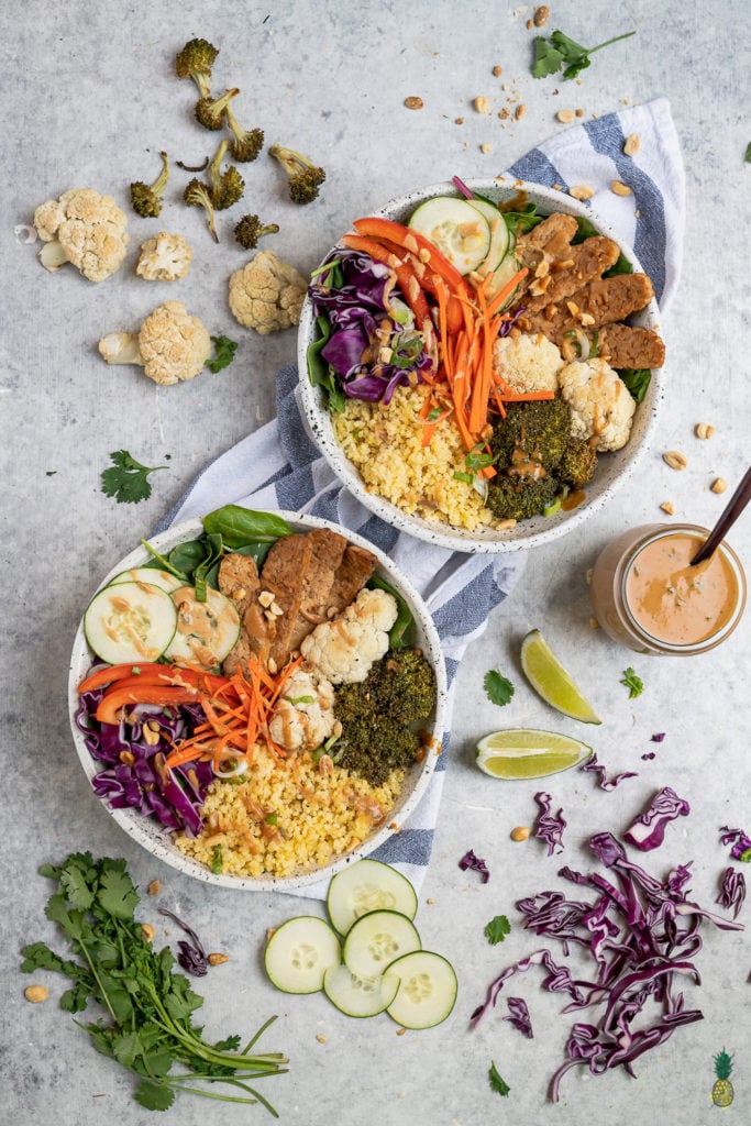 These Thai peanut grain bowls are easy to make and are perfect for an on the go lunch or dinner! Peanut Sauce, roasted veggies, tempeh, and millet, it will keep you full and fueled for the day. Plus, they are vegan and can easily be made gluten-free. #vegan #glutenfree #backtoschool #grainbowl #millet #lunch #entree #kids #protein #tempeh #easy #mealprep #easyvegan #healthy