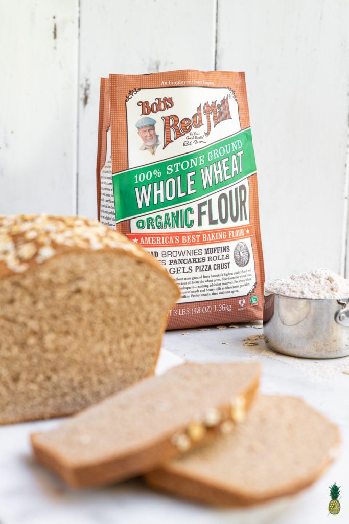 A simple and delicious recipe for the perfect homemade 100% whole wheat bread loaf. It's great for sandwiches, toast, and beyond! #homemade #wholewheat #bread #loaf #sandwich #backtoschool #kids #savemoney #budget #easy #wholegrain 