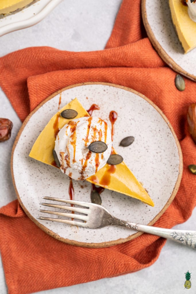 Vegan Pumpkin Chai Cheesecake with Whipped Cream Close up