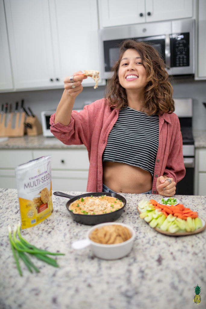Girl posing with onion dip vegan