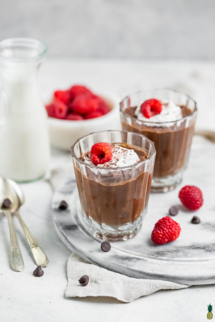 3-ingredient vegan chocolate mousse close up with raspberries