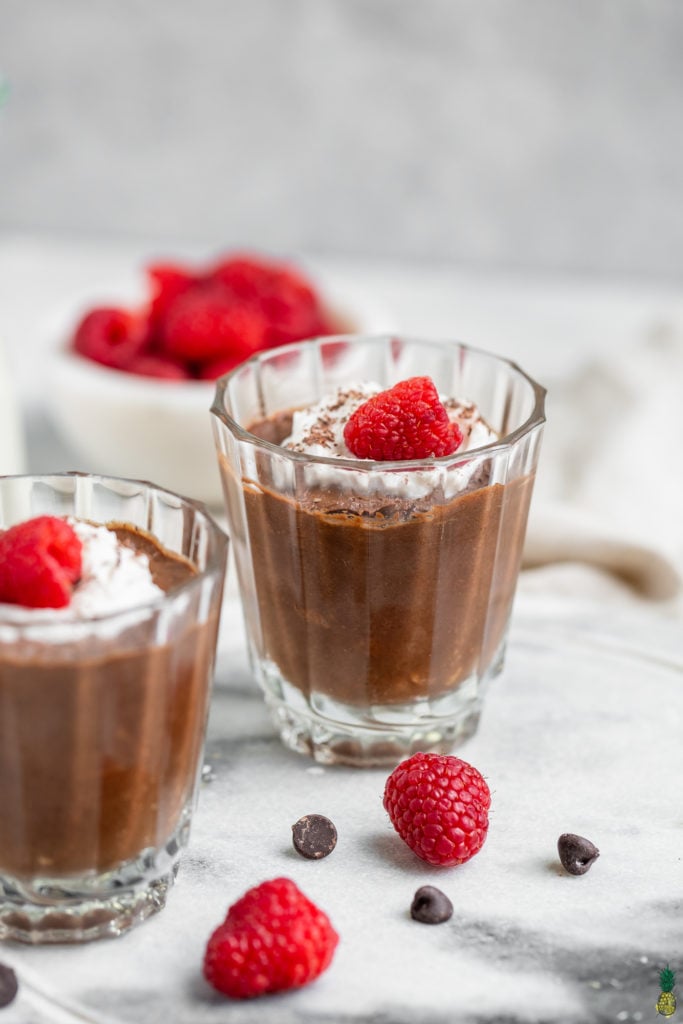 3-ingredient vegan chocolate mousse close up with raspberries