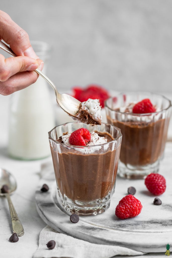 3-ingredient vegan chocolate mousse close up with raspberries