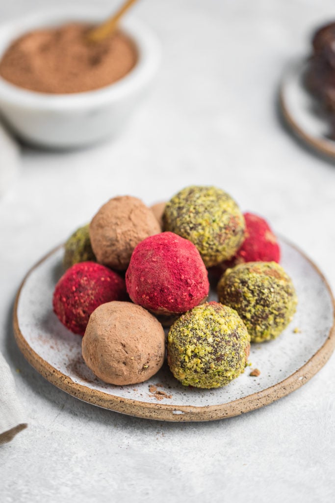 Colorful vegan truffles on a serving plate