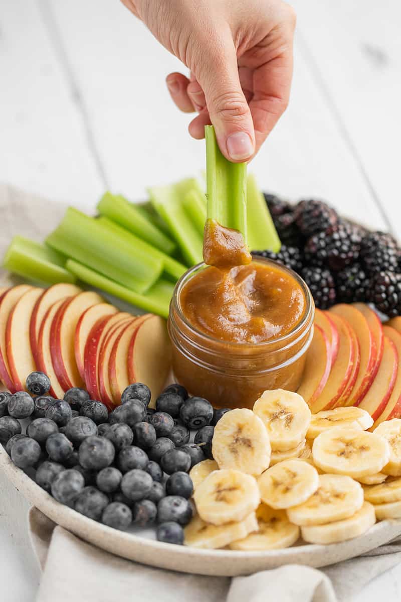 scooping date caramel with celery