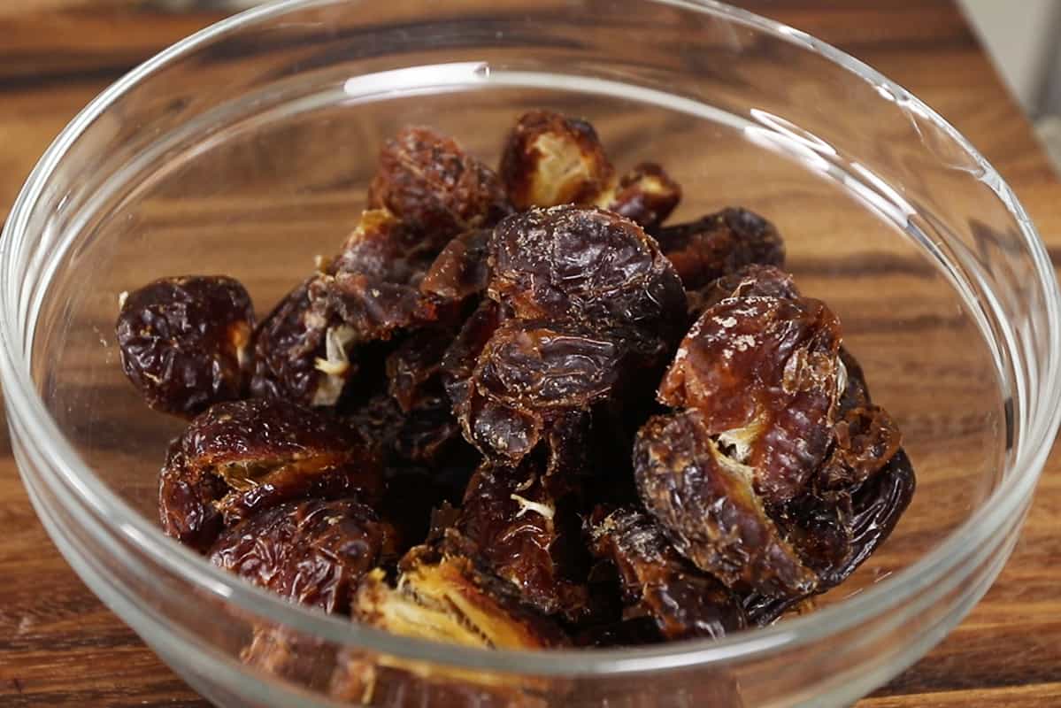 pitted medjool dates in a glass bowl