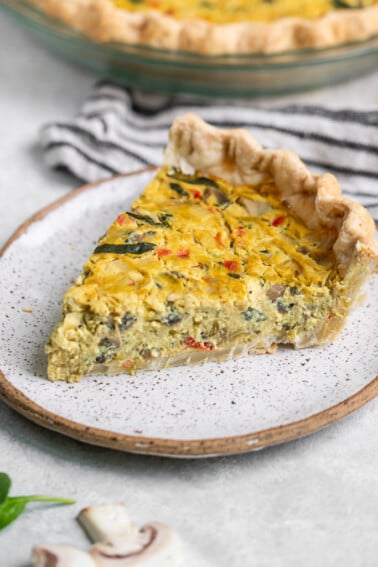 A slice of vegan quiche on a plate - perfect!