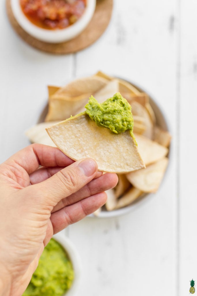 homemade tortilla chip with guacamole