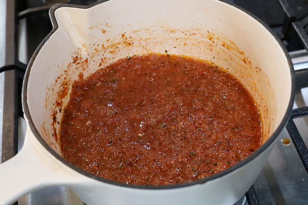 homemade ranchero salsa in pot for huevos rancheros