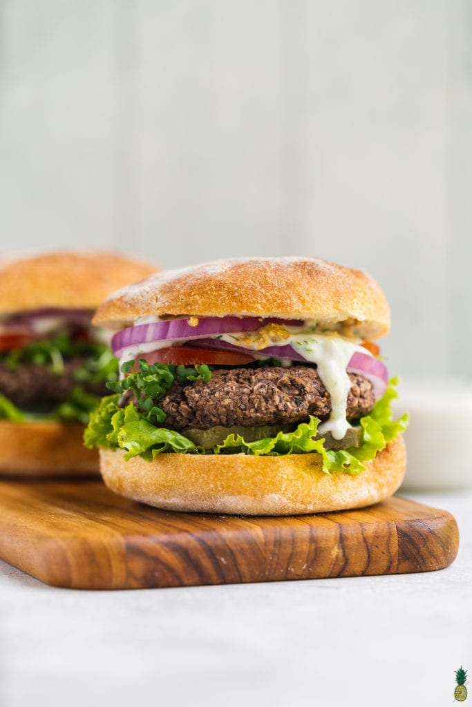 Close up shot of a 5 ingredient veggie burger by sweet simple vegan