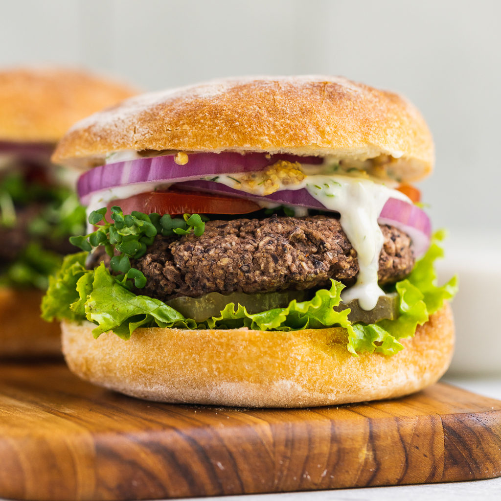Close up shot of a 5 ingredient veggie burger by sweet simple vegan