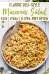 Vegan classic deli-style macaroni salad with serving spoon for pinterest