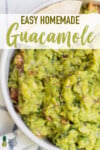 A closeup shot of guacamole with tortilla chips for pinterest by Sweet Simple Vegan