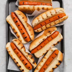 Grilled vegan carrot hot dogs in grilled buns by sweet simple vegan