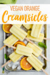 5 ingredient vegan orange creamsicle popsicles on a tray by sweet simple vegan for pinterest