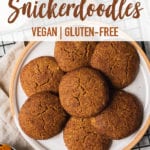 vegan gluten free pumpkin snickerdoodles on a plate with a cooling rack and almond milk for pinterest