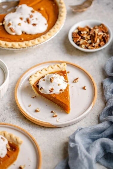 vegan pumpkin pie on a white plate