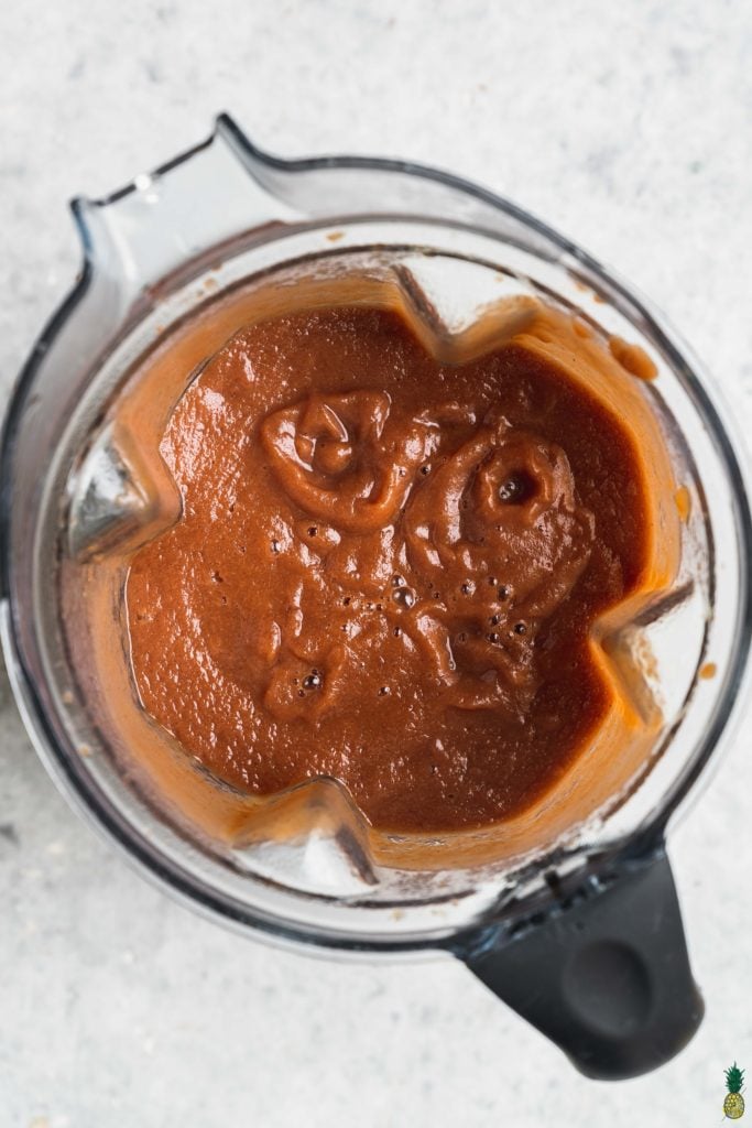 a blender with homemade instant pot apple butter