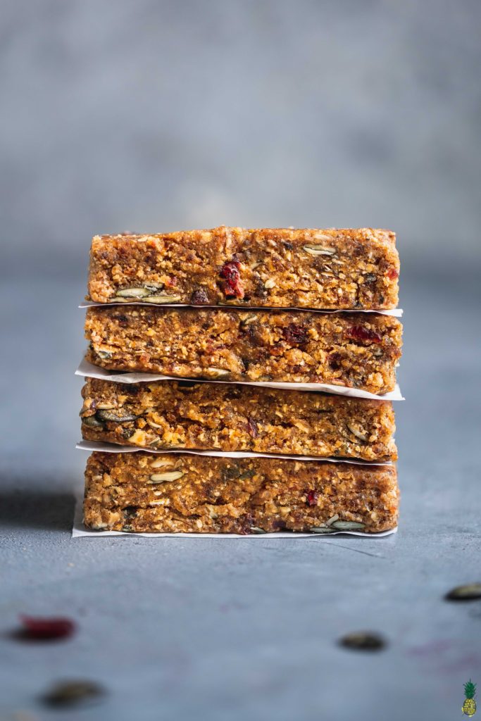 A stack of no bake peanut butter breakfast bars by sweet simple vegan