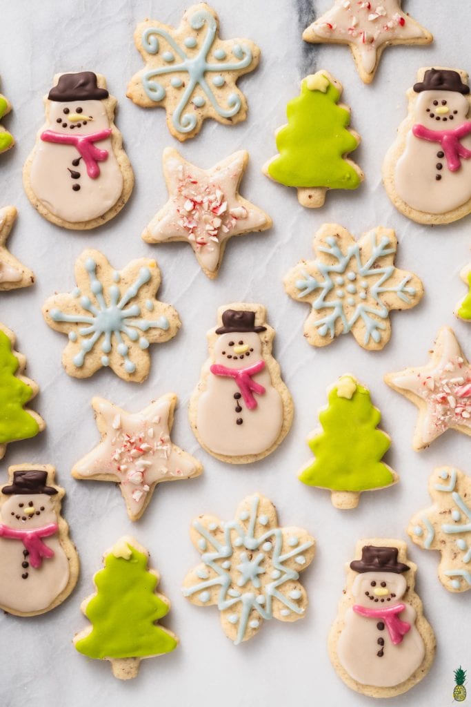 Christmas Recipe - An overhead shot of colorful christmas cookies on a marble board; food photography