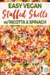 a close up shot of spinach and ricotta stuffed shells for pinterest