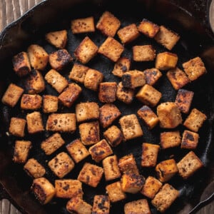 overhead ginger sesame tofu in cast iron skillet